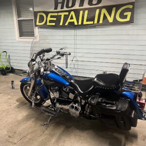 A motorcycle parked in front of a building.