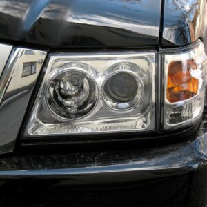 A close up of the headlight on a car