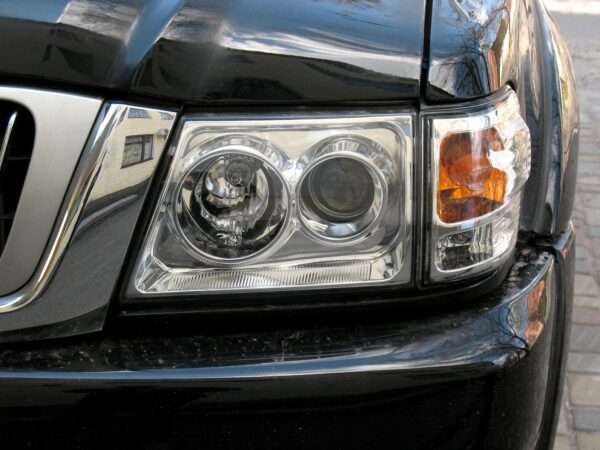 A close up of the headlight on a car